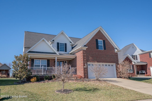 view of front of property with a garage, a front lawn, and a porch