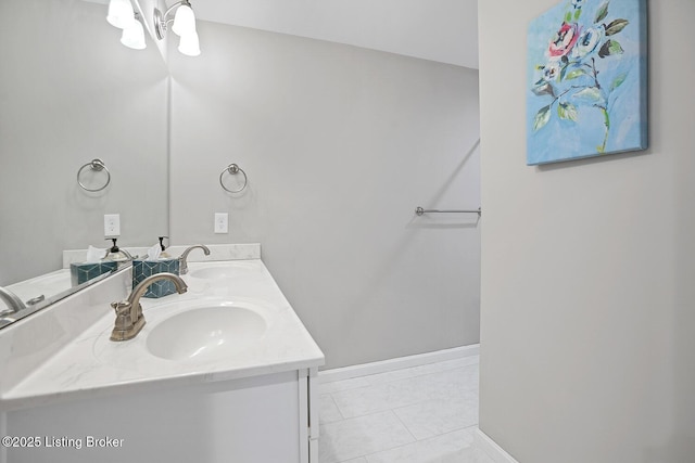 bathroom with tile patterned flooring and vanity