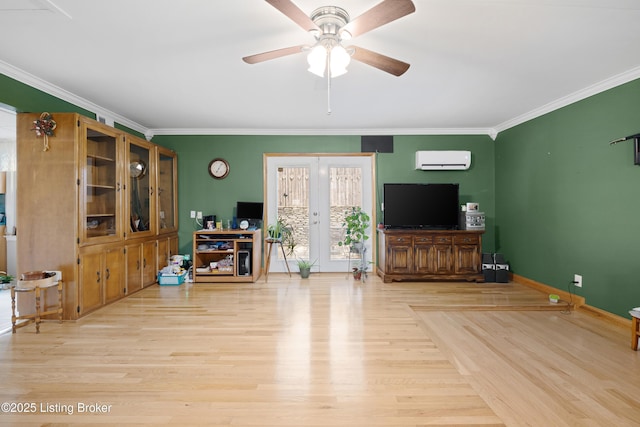 living room featuring an AC wall unit, crown molding, ceiling fan, and light hardwood / wood-style flooring