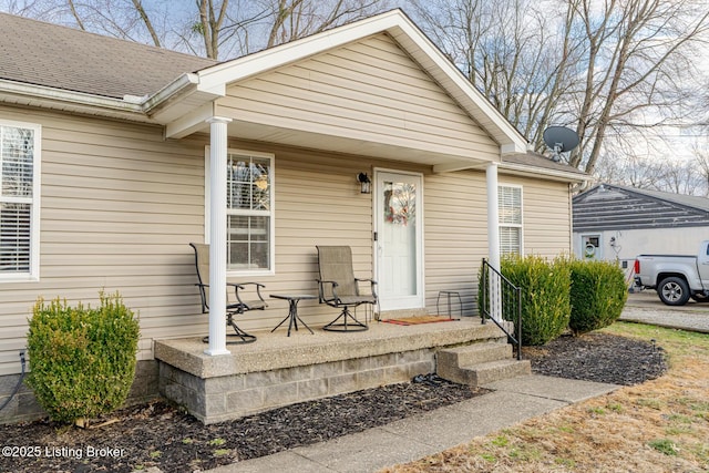 doorway to property with covered porch