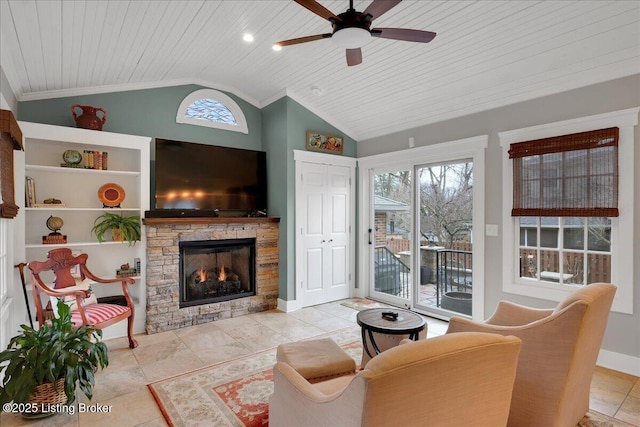 living room featuring light tile patterned flooring, a fireplace, lofted ceiling, ceiling fan, and wood ceiling