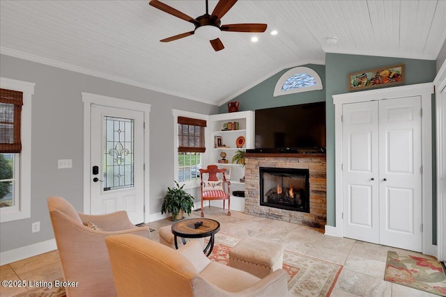 living room with light tile patterned floors, crown molding, ceiling fan, a fireplace, and vaulted ceiling