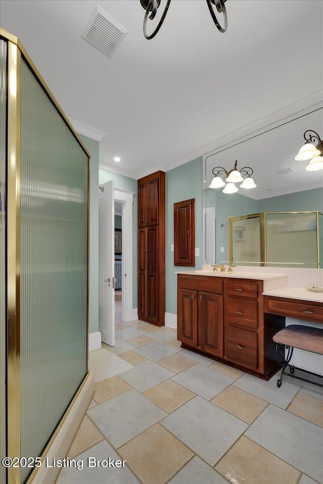 bathroom with vanity and an enclosed shower