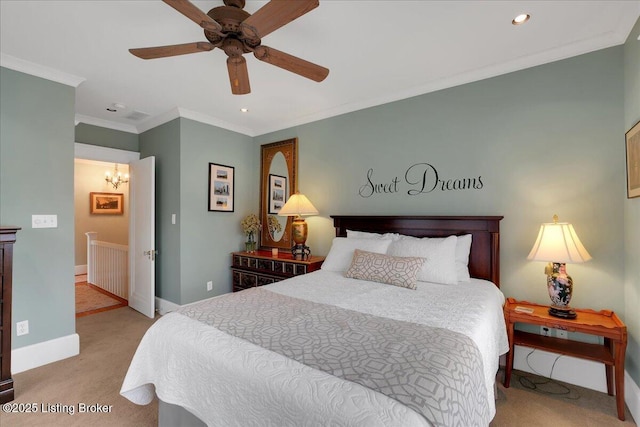 carpeted bedroom featuring ceiling fan with notable chandelier and ornamental molding