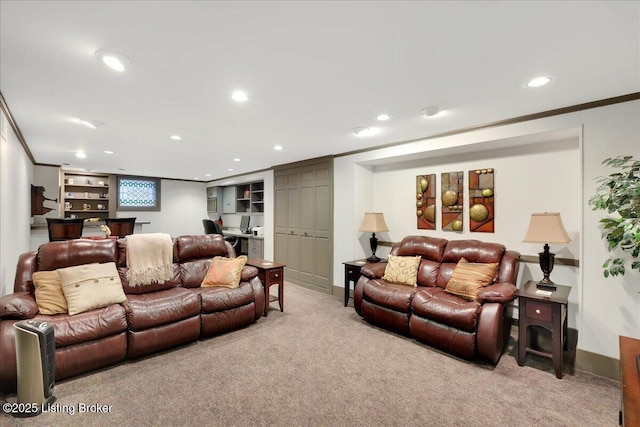 living room with ornamental molding and light carpet