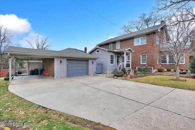 view of front of house featuring a garage, a carport, and a front lawn