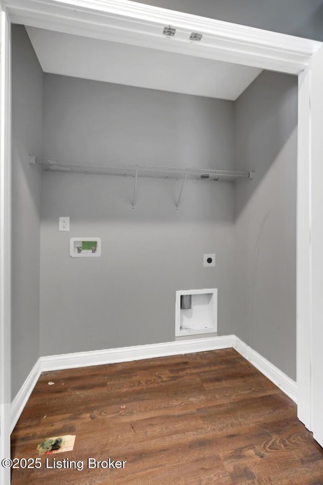 clothes washing area featuring hookup for a washing machine, laundry area, wood finished floors, baseboards, and electric dryer hookup