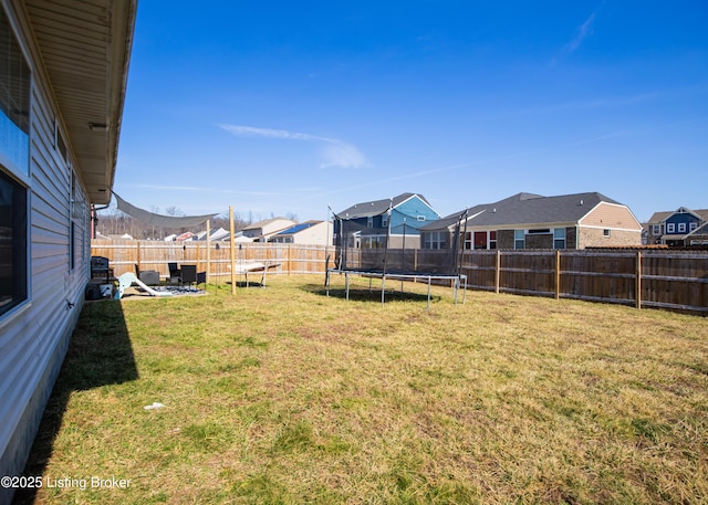 view of yard featuring a trampoline