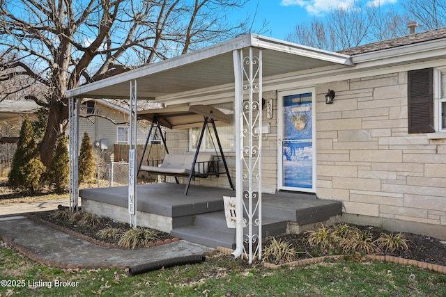 exterior space featuring covered porch