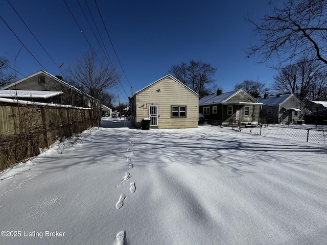 view of snow covered house