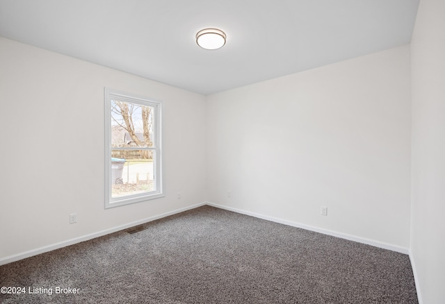 view of carpeted spare room