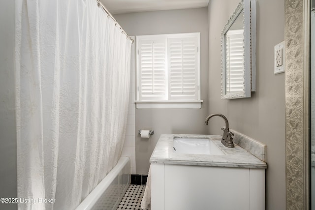 bathroom with shower / bath combination with curtain and vanity