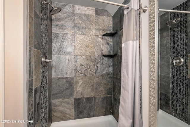 bathroom featuring walk in shower