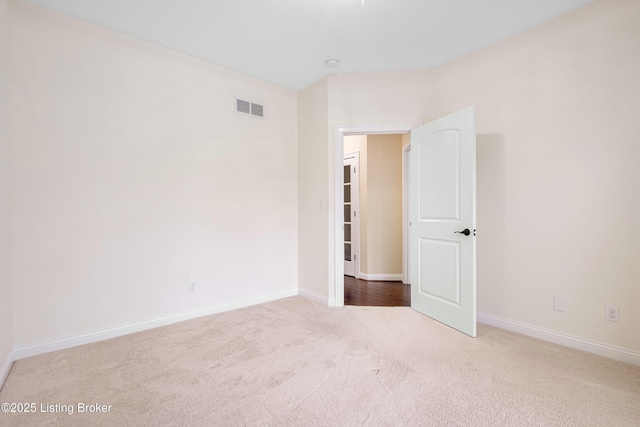 unfurnished room featuring carpet floors