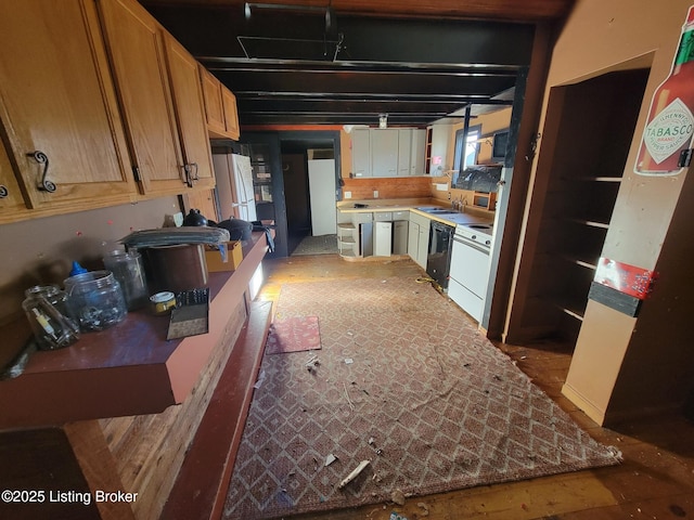 kitchen with white appliances and sink