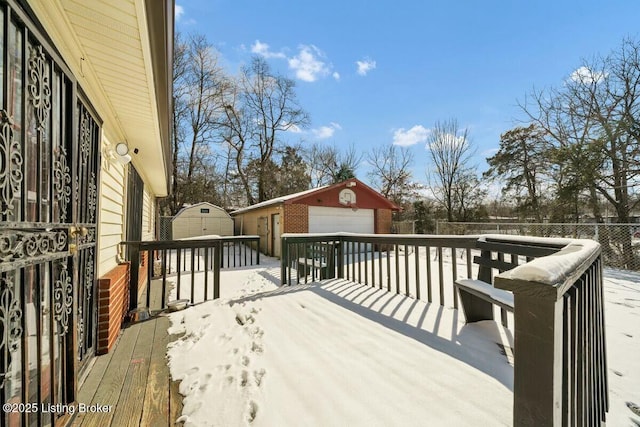 wooden terrace with an outbuilding