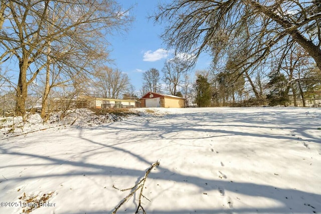 view of yard layered in snow