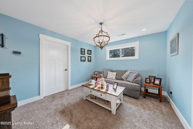 living area featuring a chandelier, carpet, visible vents, and baseboards