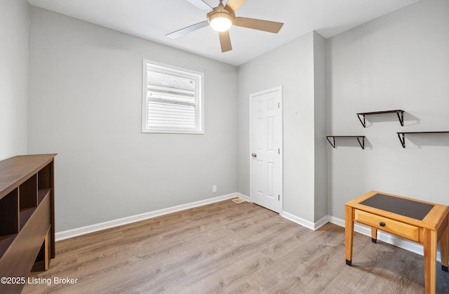 interior space with ceiling fan and light wood-type flooring