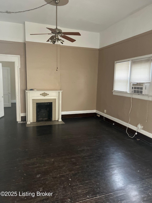 unfurnished living room with dark hardwood / wood-style flooring, cooling unit, and ceiling fan