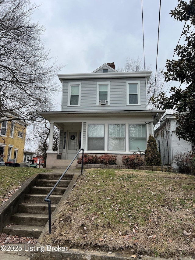 view of front property featuring a front lawn