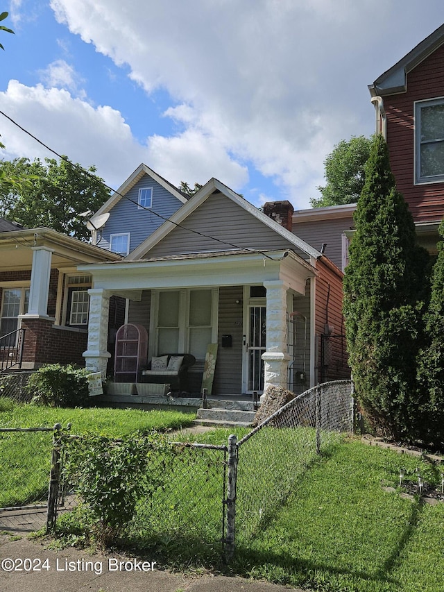 view of front of property featuring covered porch