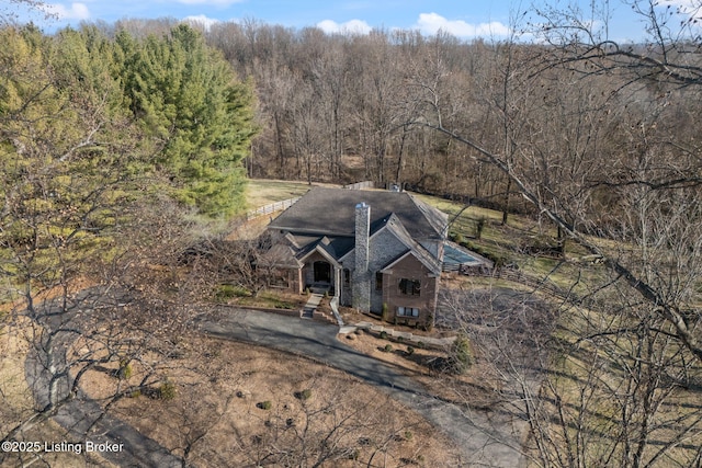 bird's eye view with a forest view