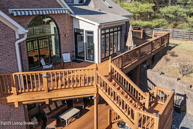 wooden terrace with fence and stairway