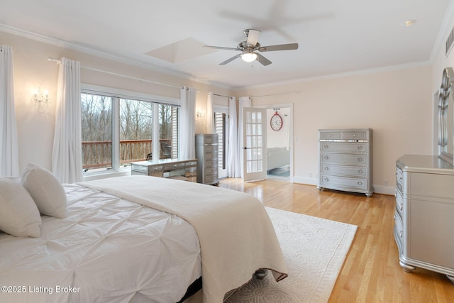 bedroom with ornamental molding, ceiling fan, light wood-style flooring, and baseboards