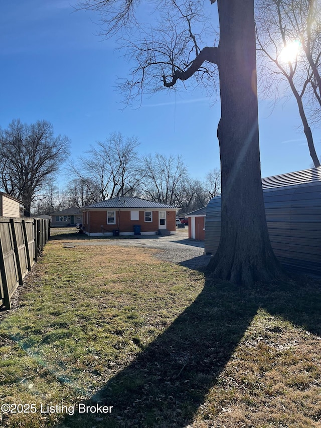 view of yard with fence