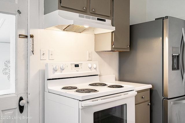 kitchen featuring stainless steel fridge with ice dispenser and white range with electric stovetop