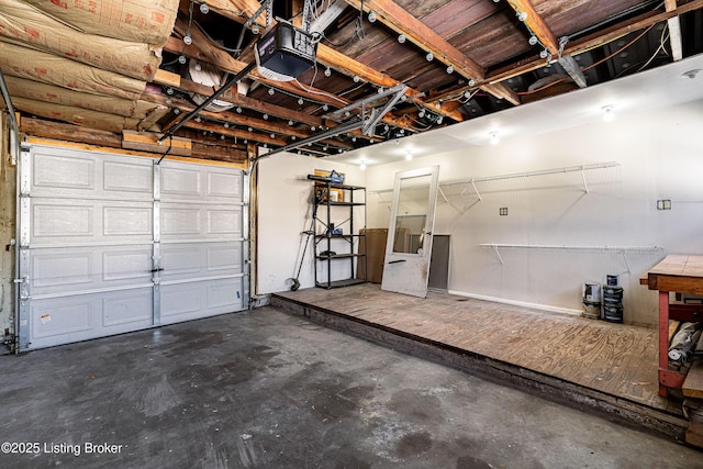 garage featuring a garage door opener