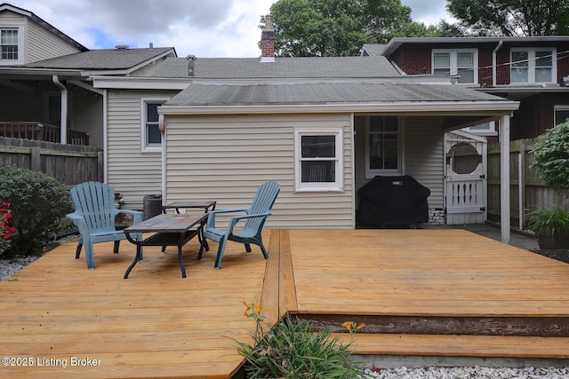 wooden terrace featuring grilling area