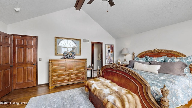 bedroom with a textured ceiling, high vaulted ceiling, visible vents, dark wood-style floors, and beamed ceiling