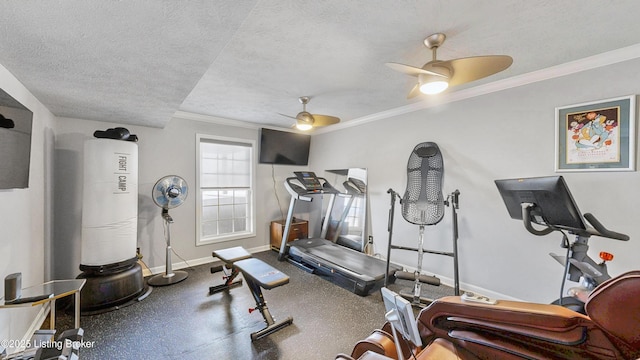 workout room featuring a ceiling fan, crown molding, baseboards, and a textured ceiling