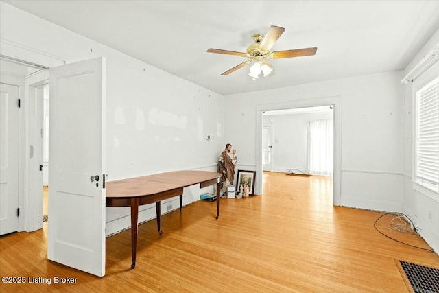 interior space with light hardwood / wood-style floors and ceiling fan