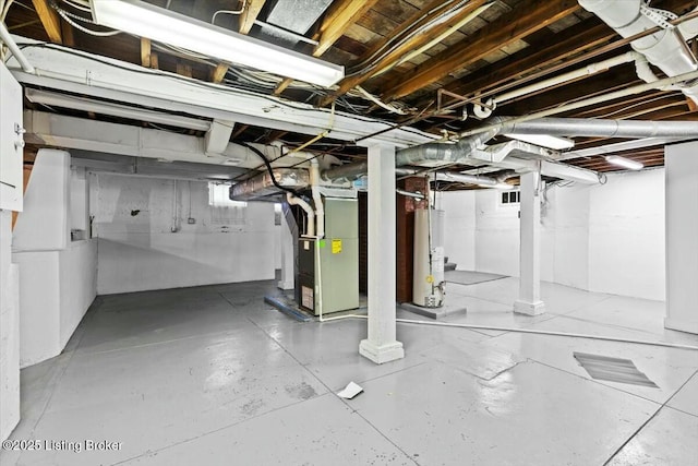 basement with heating unit and gas water heater