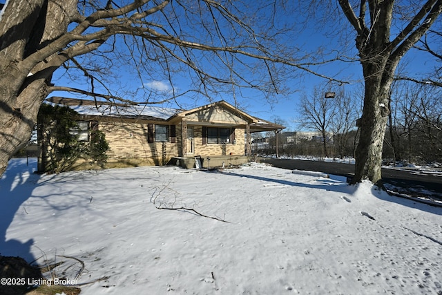 view of front of home with brick siding