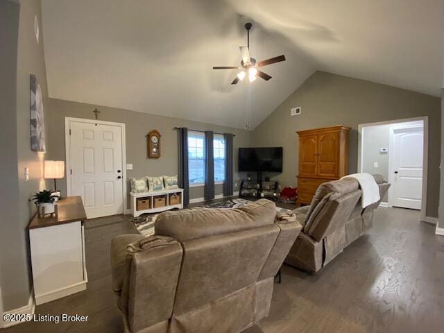 living room featuring vaulted ceiling, dark hardwood / wood-style floors, and ceiling fan