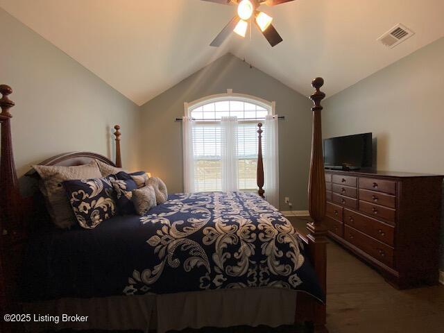 bedroom featuring vaulted ceiling and ceiling fan