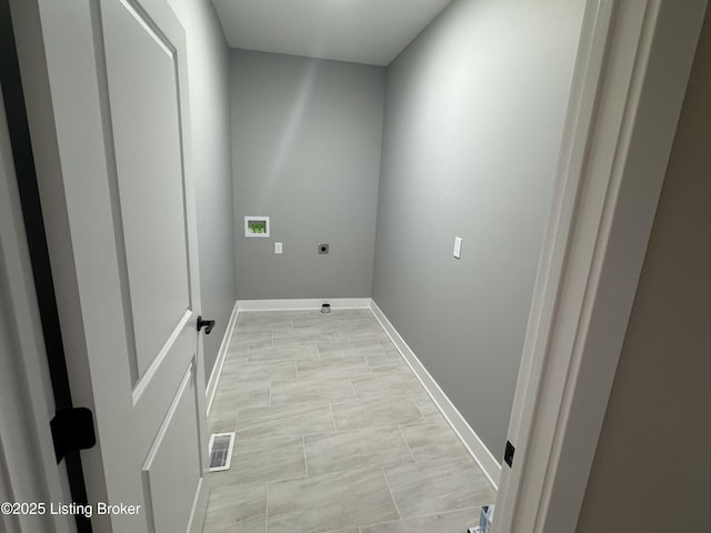 laundry room with hookup for a washing machine and hookup for an electric dryer