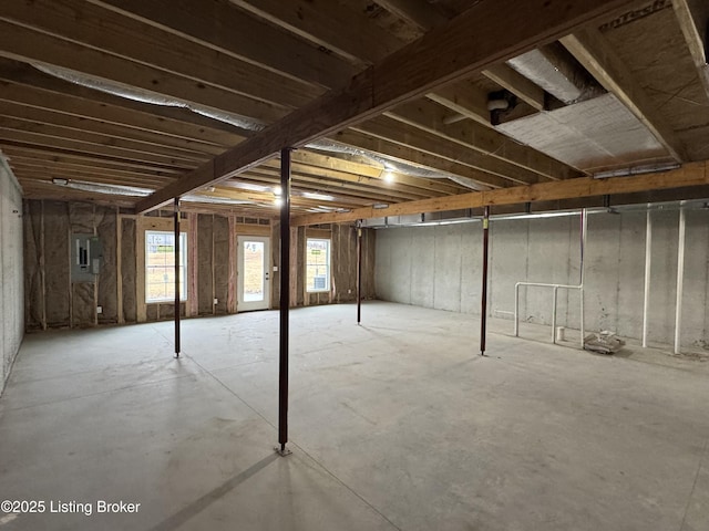 basement featuring electric panel