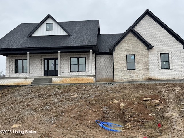 view of front of home featuring covered porch