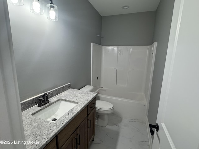 full bathroom with vanity, toilet, and washtub / shower combination