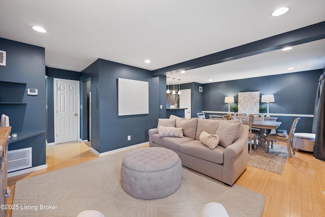 living room with hardwood / wood-style floors