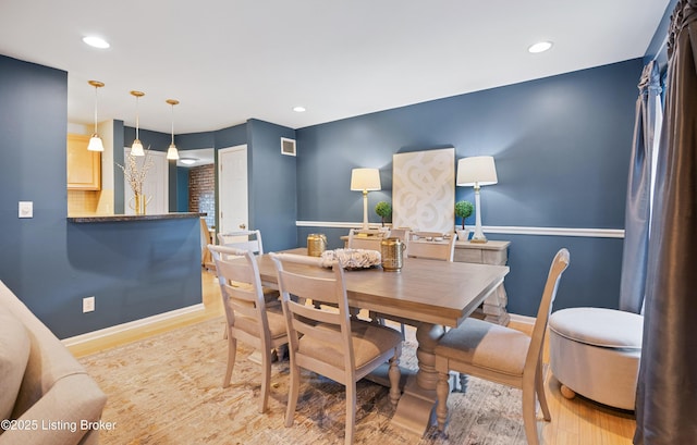 dining area featuring light hardwood / wood-style flooring