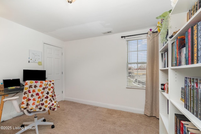 office space with carpet, visible vents, and baseboards