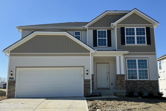 craftsman-style house featuring stone siding, concrete driveway, and a garage