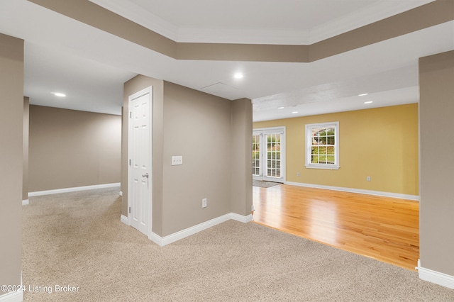 unfurnished room featuring light carpet, recessed lighting, and baseboards