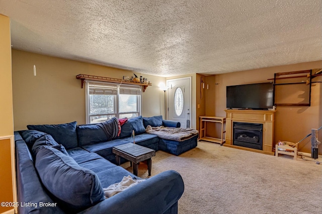 carpeted living room with a textured ceiling